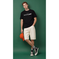 NOVEINO Zero t-shirt in black with minimalist NOVEINO logo design on the front, casual fit, soft fabric, and crew neck style.