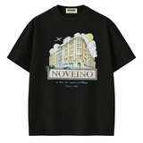 NOVEINO corner t-shirt featuring a modern design, soft fabric, and a comfortable fit, displayed on a hanger against a plain background.