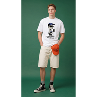 NOVEINO Lucerne t-shirt displayed on a hanger, featuring a casual fit and soft fabric in a neutral color.