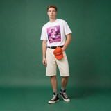 Light pink Lumière Rosé t-shirt by NOVEINO displayed on a hanger with minimal background.