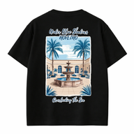 Blue NOVEINO Ocean T-shirt with ocean wave graphic, soft cotton fabric, casual fit, and vibrant blue color.