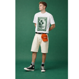 NOVEINO T-shirt with postage-inspired graphic design, casual fit, and soft fabric, displayed on a plain background.
