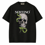 NOVEINO snake skull memorabilia, featuring a detailed replica of a snake skull, part of Beatles-themed collectible items