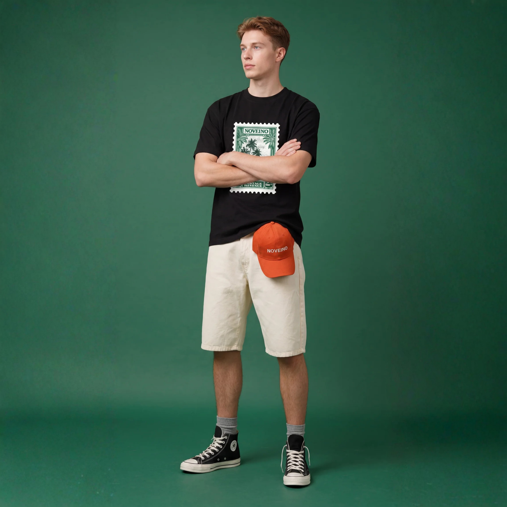 NOVEINO t-shirt with postage stamp graphic, casual fit, soft fabric, and short sleeves, displayed on a white background.